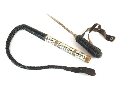 Lot 98 - North African camel whip, early 20th century