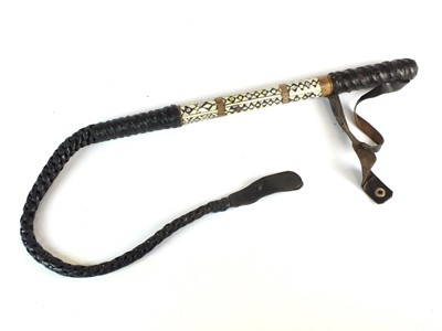 Lot 98 - North African camel whip, early 20th century