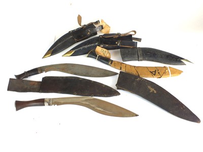 Lot 58 - Three WW2 kukri knives and two spare sheaths