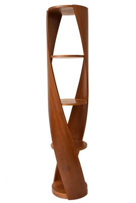 Lot 588 - A Tom Schneider walnut veneered 'DNA Whole Twist' shelving unit