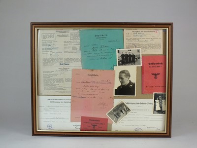 Lot 302 - Documents and photographs relating to Stabsgefreiter Fischer (Panzer Division)