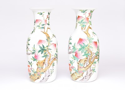 Lot 42 - A pair of very large Chinese famille rose 'Nine Peaches' vases