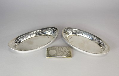 Lot 29 - A pair of pierced silver dishes and a  silver card case