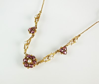Lot 69 - An early 20th century style 9ct gold garnet and and seed pearl necklace