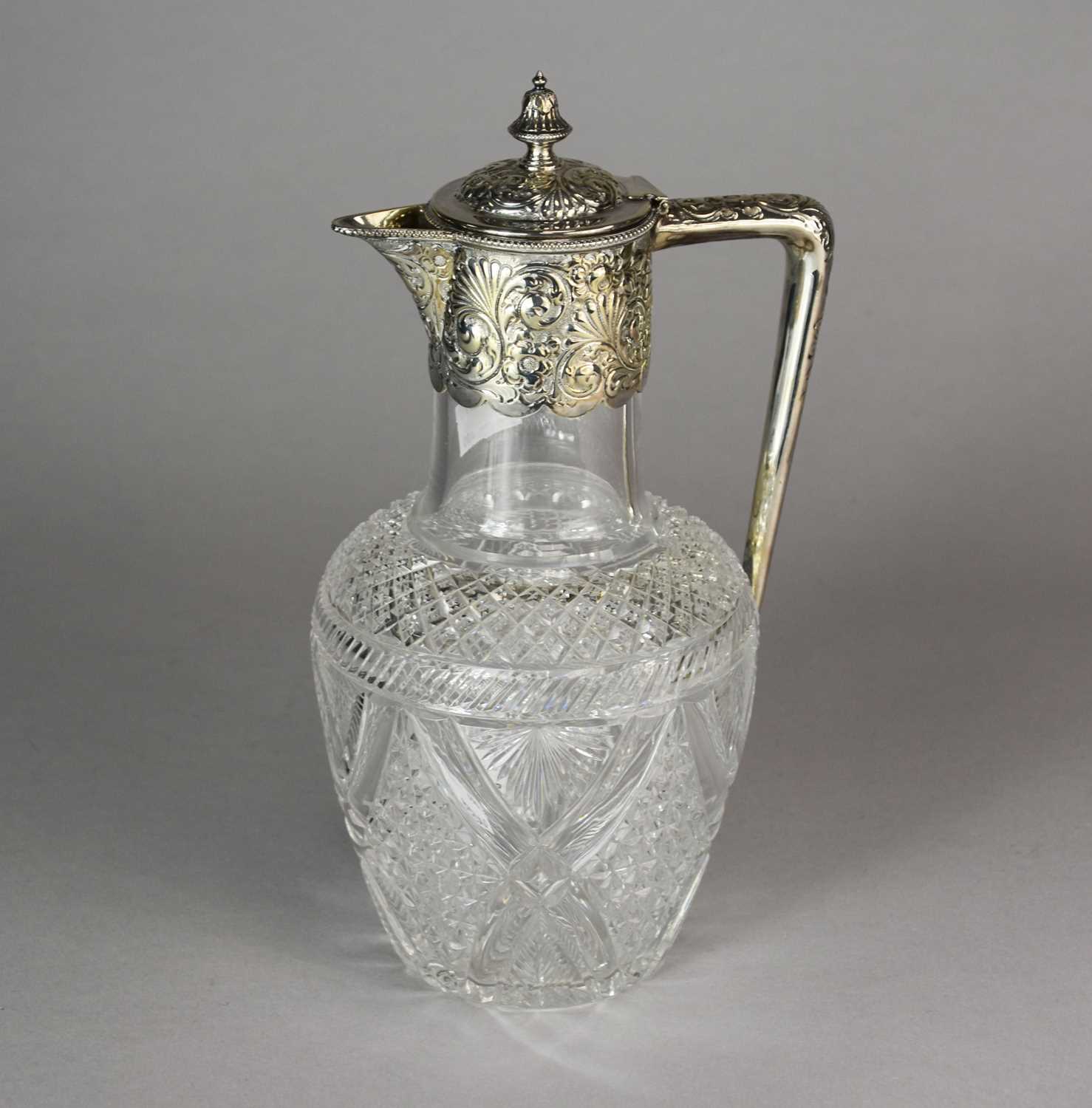 Lot 20 - A Victorian silver mounted cut glass claret jug