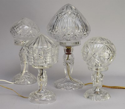 Lot 542 - Four various cut glass table lamps, 20th century
