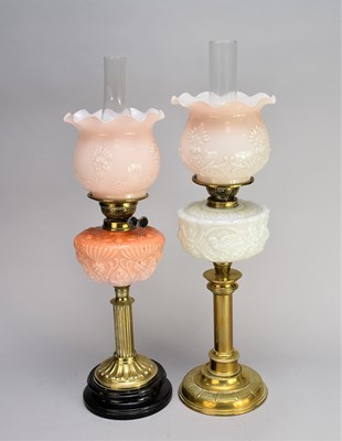 Lot 545 - An Edwardian brass and glass oil lamp and another similar