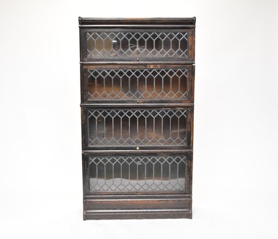 Lot 577 - An oak Globe Wernicke four-tier bookcase