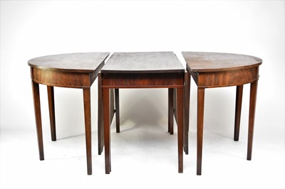 Lot 579 - A George III mahogany D-end dining table
