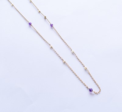 Lot 138 - A 9ct gold seed pearl and amethyst set guard chain