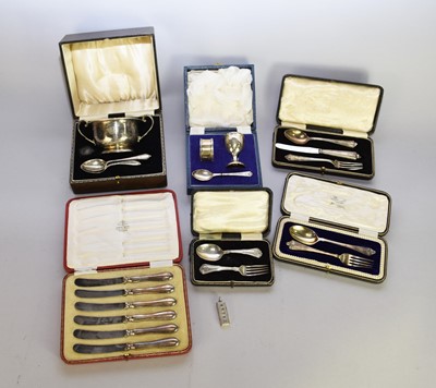 Lot 42 - A collection of cased silver wares