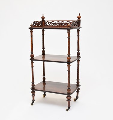 Lot 580 - A late Victorian walnut whatnot