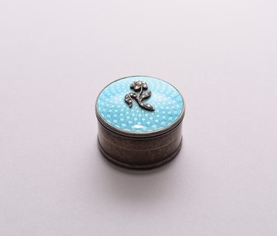 Lot 46 - A silver and enamel diamond set pill box