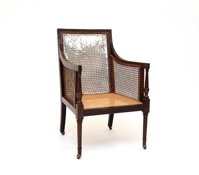 Lot 575 - A George IV library bergere chair