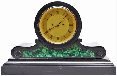 Lot 522 - A late Victorian black marble and malachite mantel clock