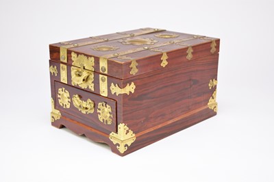 Lot 198 - A Korean brass-bound softwood musical jewellery box