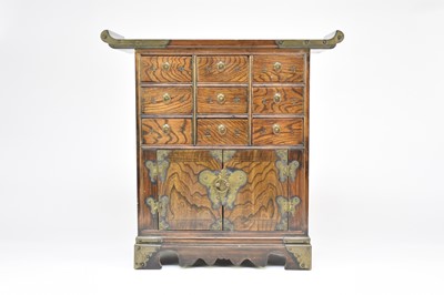 Lot 200 - A Korean brass mounted softwood chest of drawers