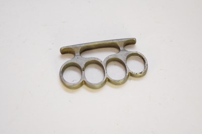 Lot 457 - An early 20th-century steel knuckle duster, of...