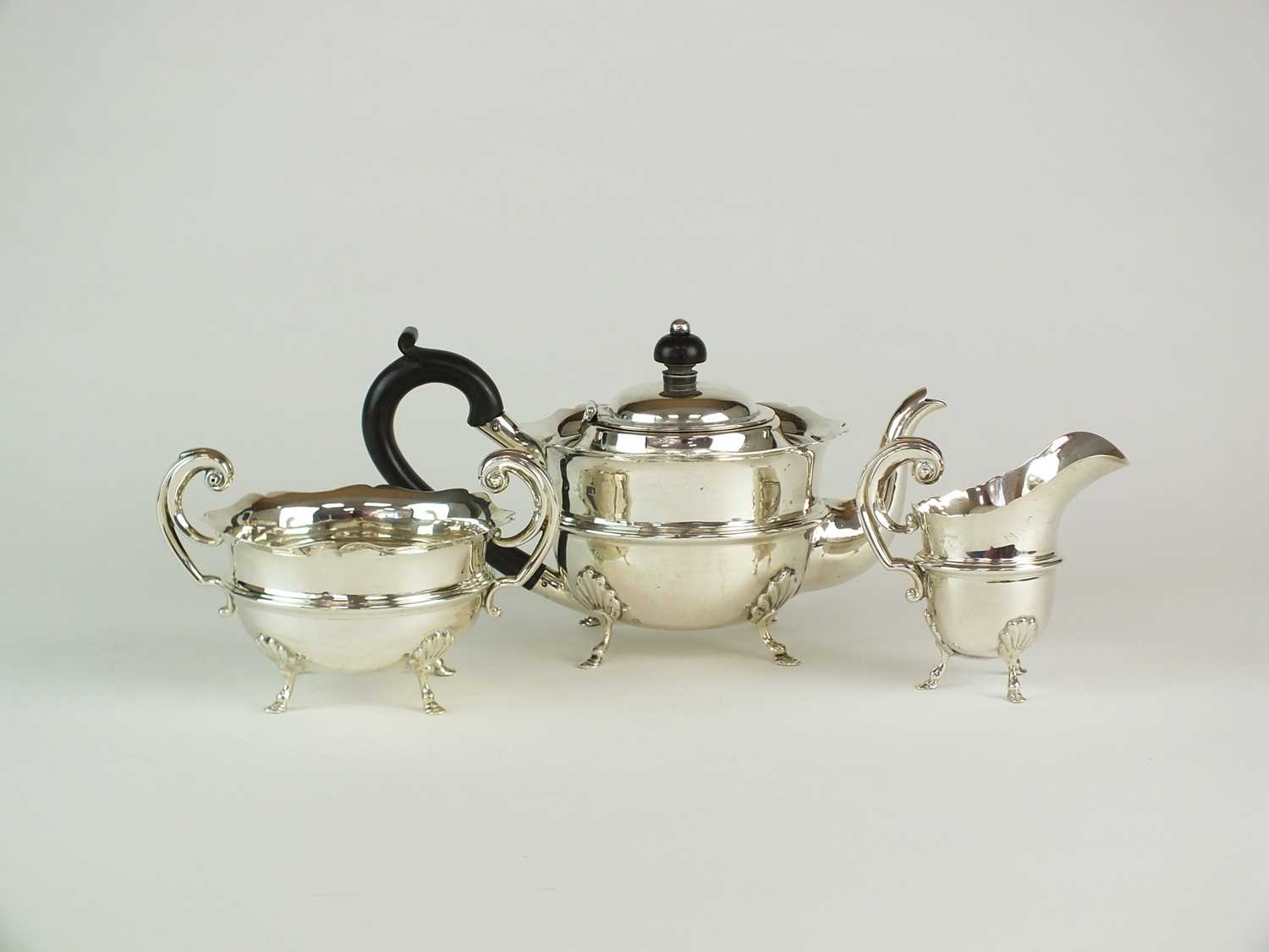 Lot 13 - A three piece silver tea service