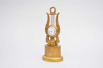 Lot 531 - A gilt metal lyre mantel timepiece