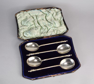 Lot 52 - A cased set of Victorian silver apostle serving spoons