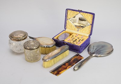 Lot 61 - A collection of silver mounted dressing table wares