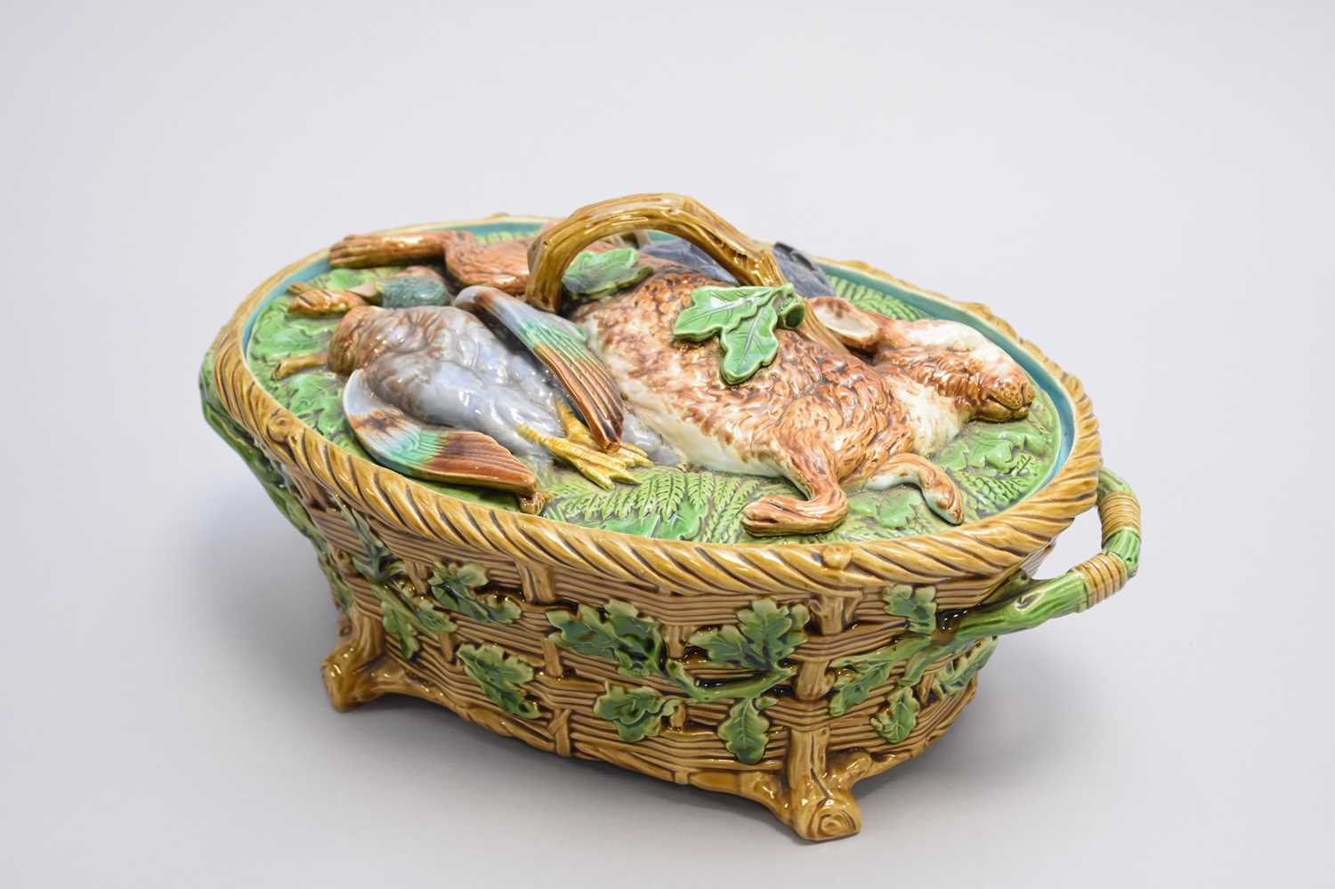 Lot 309 - A Minton majolica game pie dish