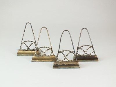 Lot 127 - A set of four white metal Staffordshire knot menu holders