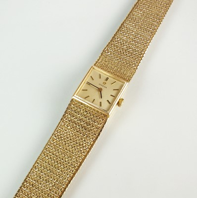 Lot 103 - A 9ct gold Omega bracelet wristwatch