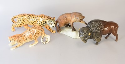 Lot 338 - Beswick models of a Puma, Bison, Leopard and a Cheetah