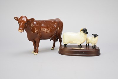 Lot 323 - Beswick Red Poll Cow and sheep