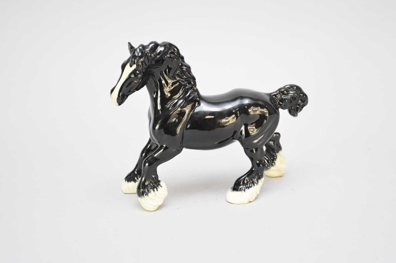 Lot 324 - Beswick Collector's Club model of black cantering shire horse