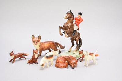 Lot 326 - A group of Beswick comprising Huntsman, foxhounds and foxes
