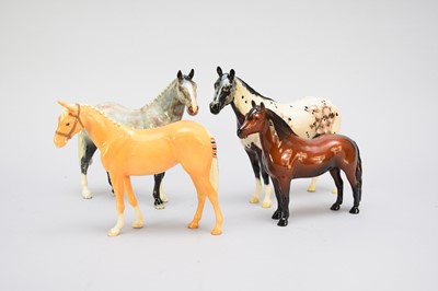 Lot 329 - Four Beswick horses including an Appaloosa Stallion