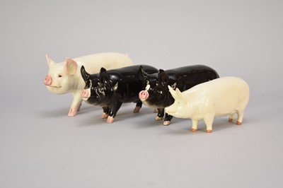 Lot 333 - Four Beswick pigs