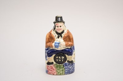 Lot 296 - Prattware 'Old Tot' figural spirit flask