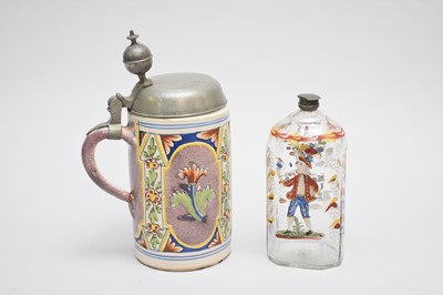 Lot 253 - 18th C German enamelled flask and a German faience stein