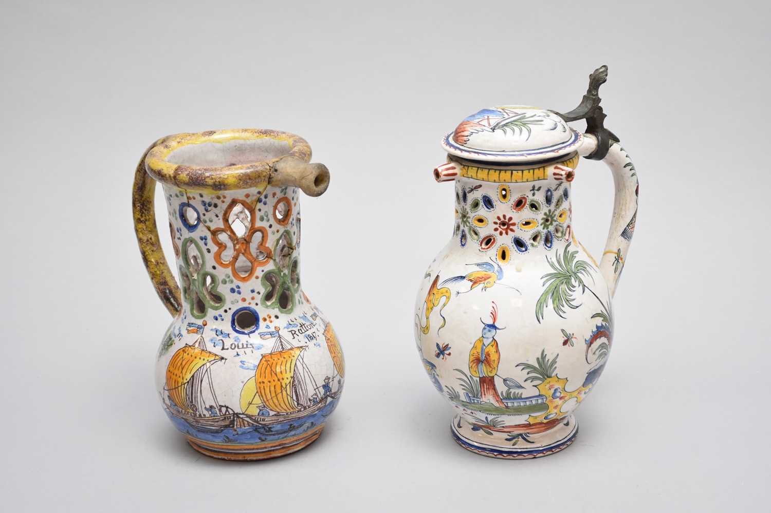 Lot 391 - Two faience puzzle jugs, 19th century