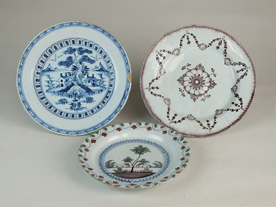 Lot 197 - Three London delft plates, 18th century