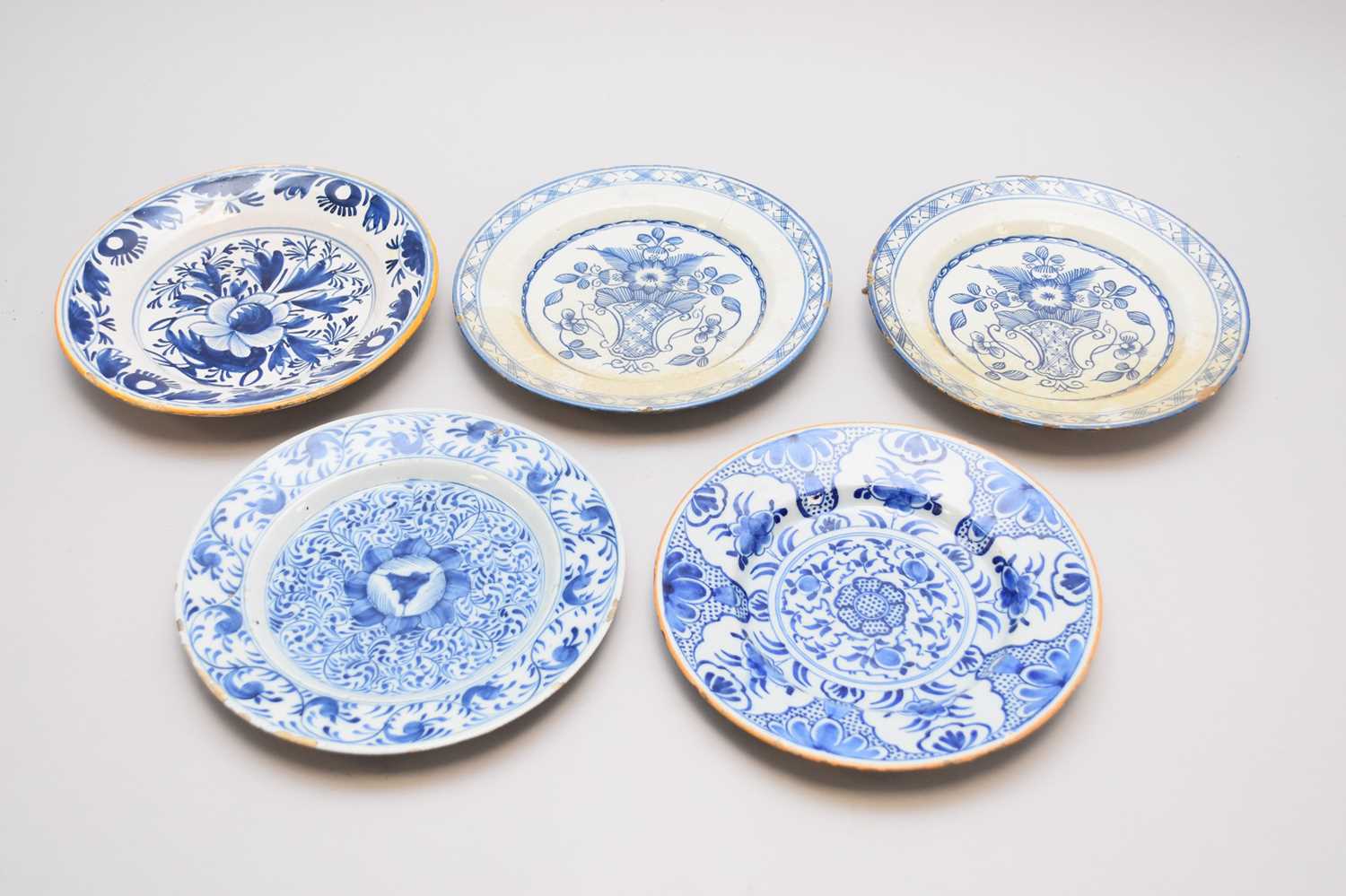 Lot 251 - Five blue and white delft plates, 18th century