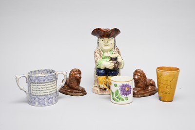 Lot 252 - A pair of salt-glaze lions and further ceramics