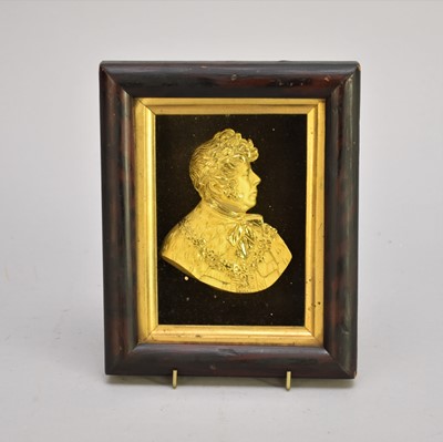Lot 501 - A gilt metal cameo portrait of George IV