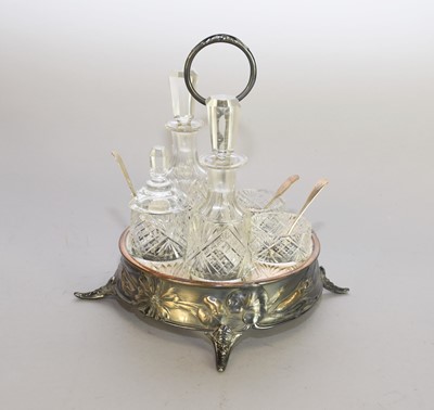 Lot 70 - An Art Nouveau silver plated and glass cruet set
