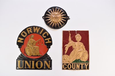 Lot 256 - Three fire marks: Norwich Union, County and Sun