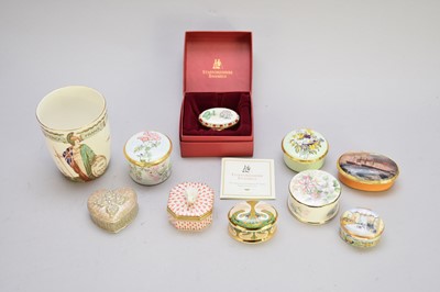 Lot 388 - A small group of enamel boxes and a Royal Doulton peace beaker