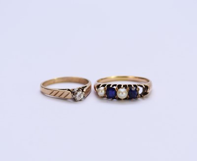 Lot 132 - A diamond ring and a blue stone and pearl ring