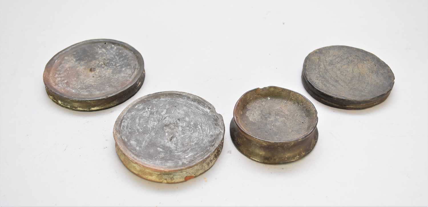 Lot 467 - Four East African Ethiopian Mursi tribe terracotta lip plates