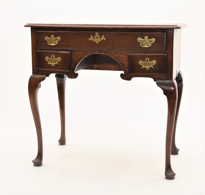 Lot 603 - An 18th century oak lowboy