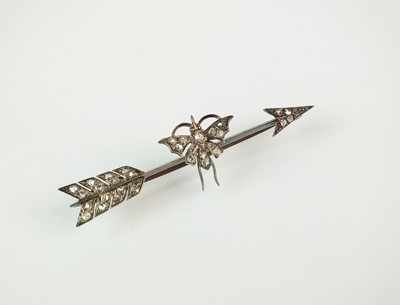 Lot 46 - A rose cut diamond set butterfly and arrow brooch