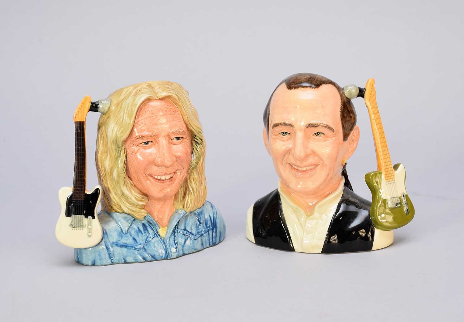 Lot 362 - A pair of Royal Doulton character jugs of Francis Rossi and Rick Parfitt